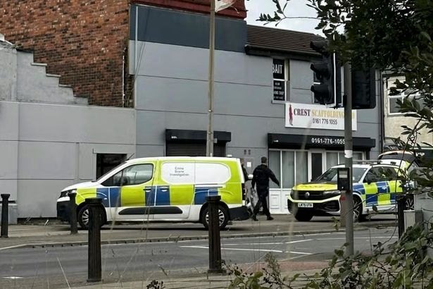 Gun and ammunition found at Salford nursery as two men arrested