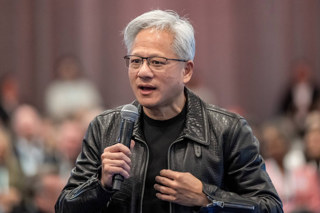 Nvidia doubles AI chip forecast as Huang blocks regulator