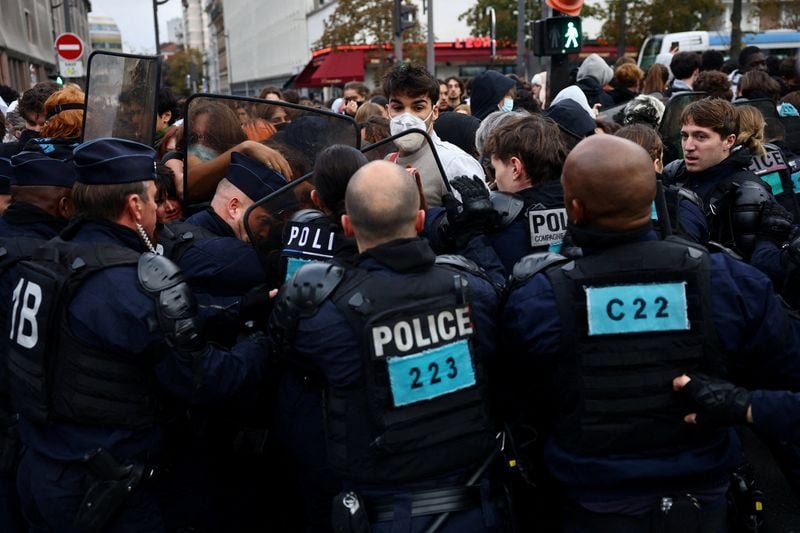 French protesters rally over rising prices and social strain