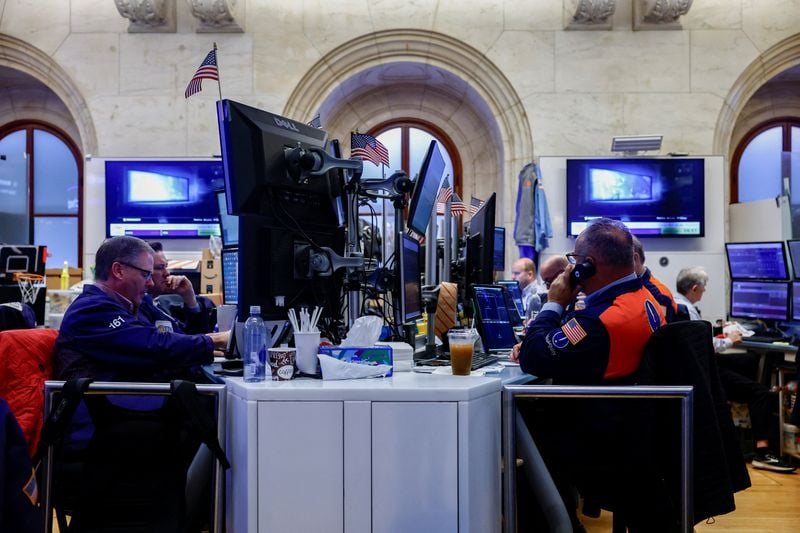 Wall Street rises as healthcare stocks rally and oil prices fall