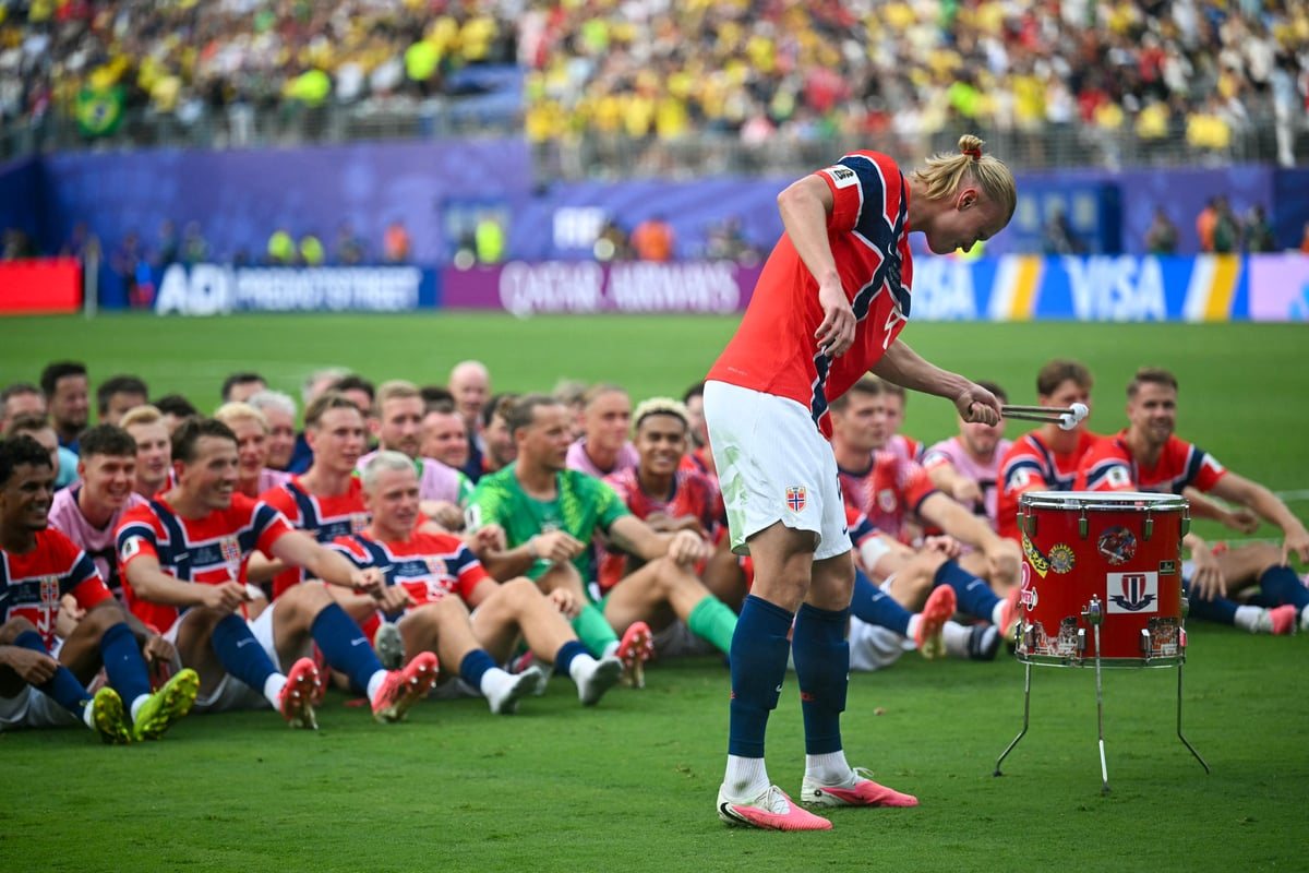 England fans embrace beer-soaked World Cup fan park celebrations