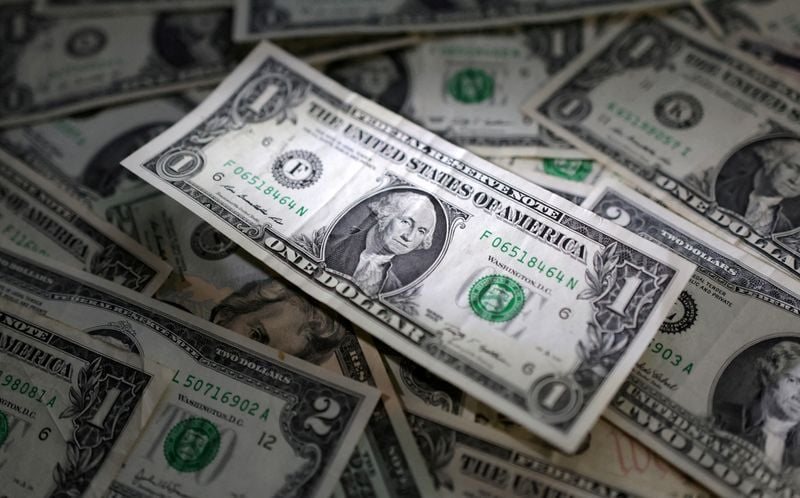 Dollar Slips From Seven-Week High as Oil Prices Extend Decline